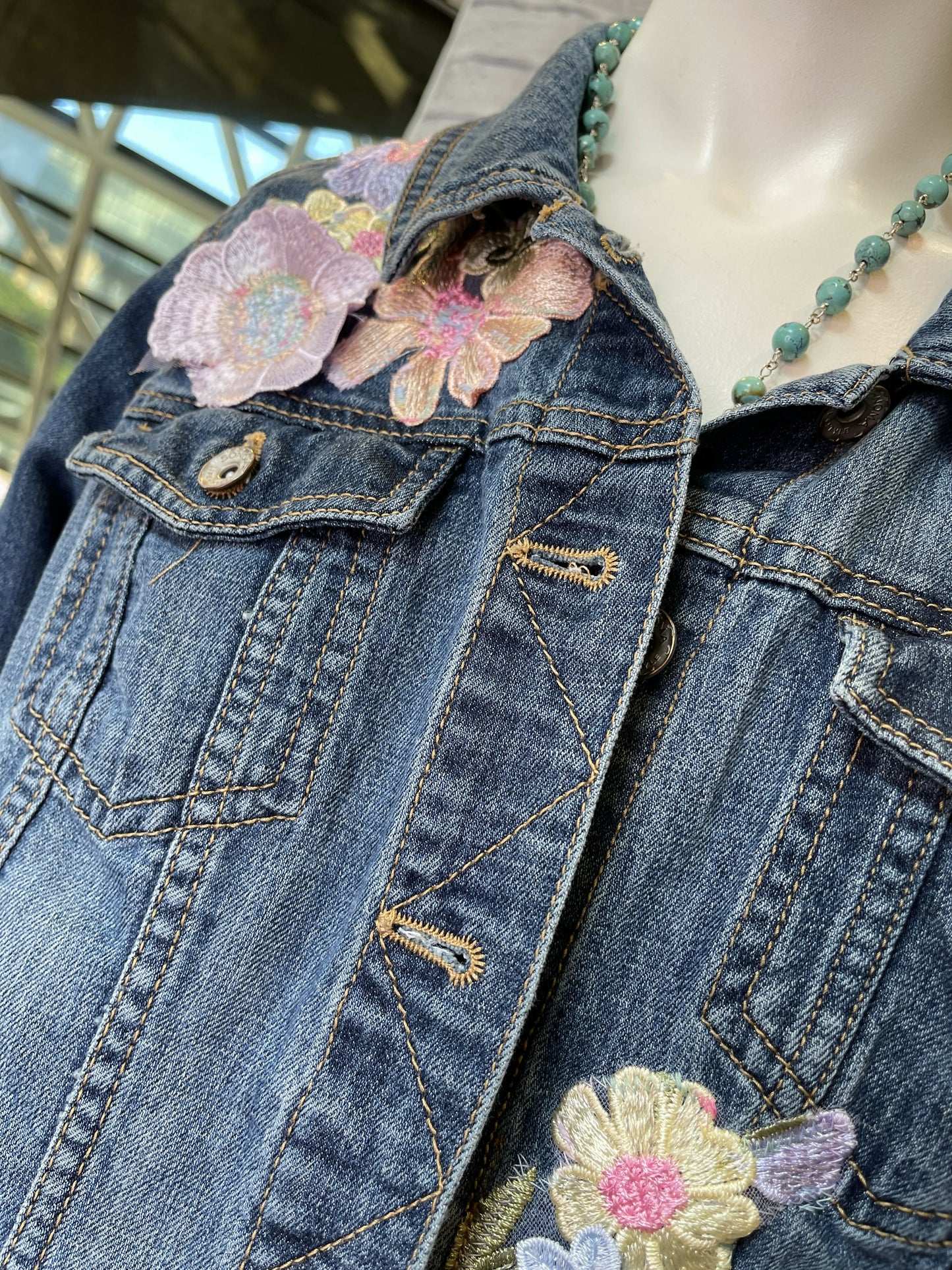 Floral jean jacket with cut out back