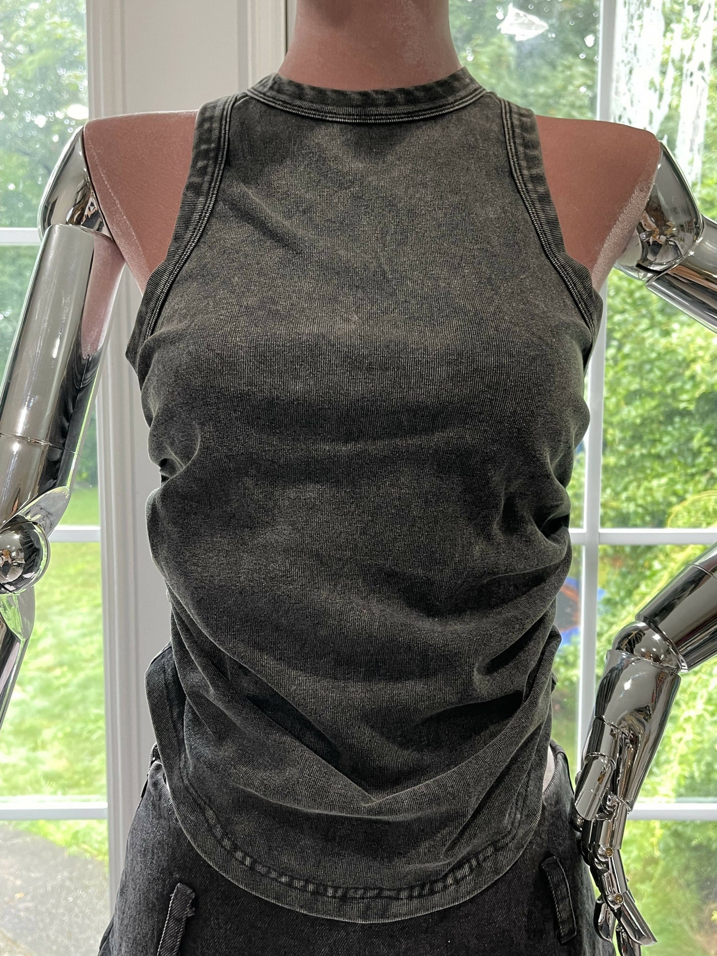 Folded Elegance: The Innovative Silhouette Sleeveless Cotton T-Shirt