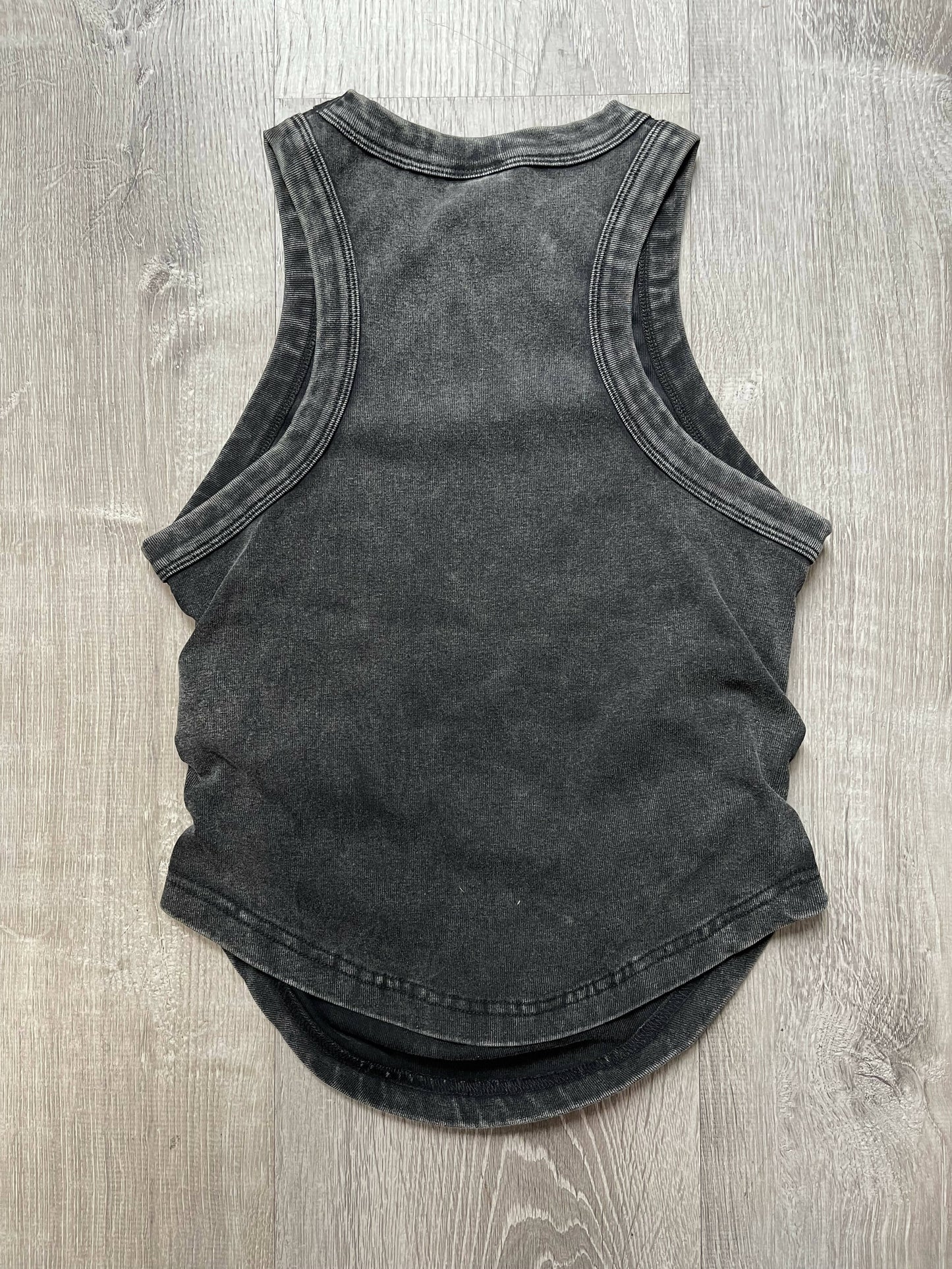 Folded Elegance: The Innovative Silhouette Sleeveless Cotton T-Shirt