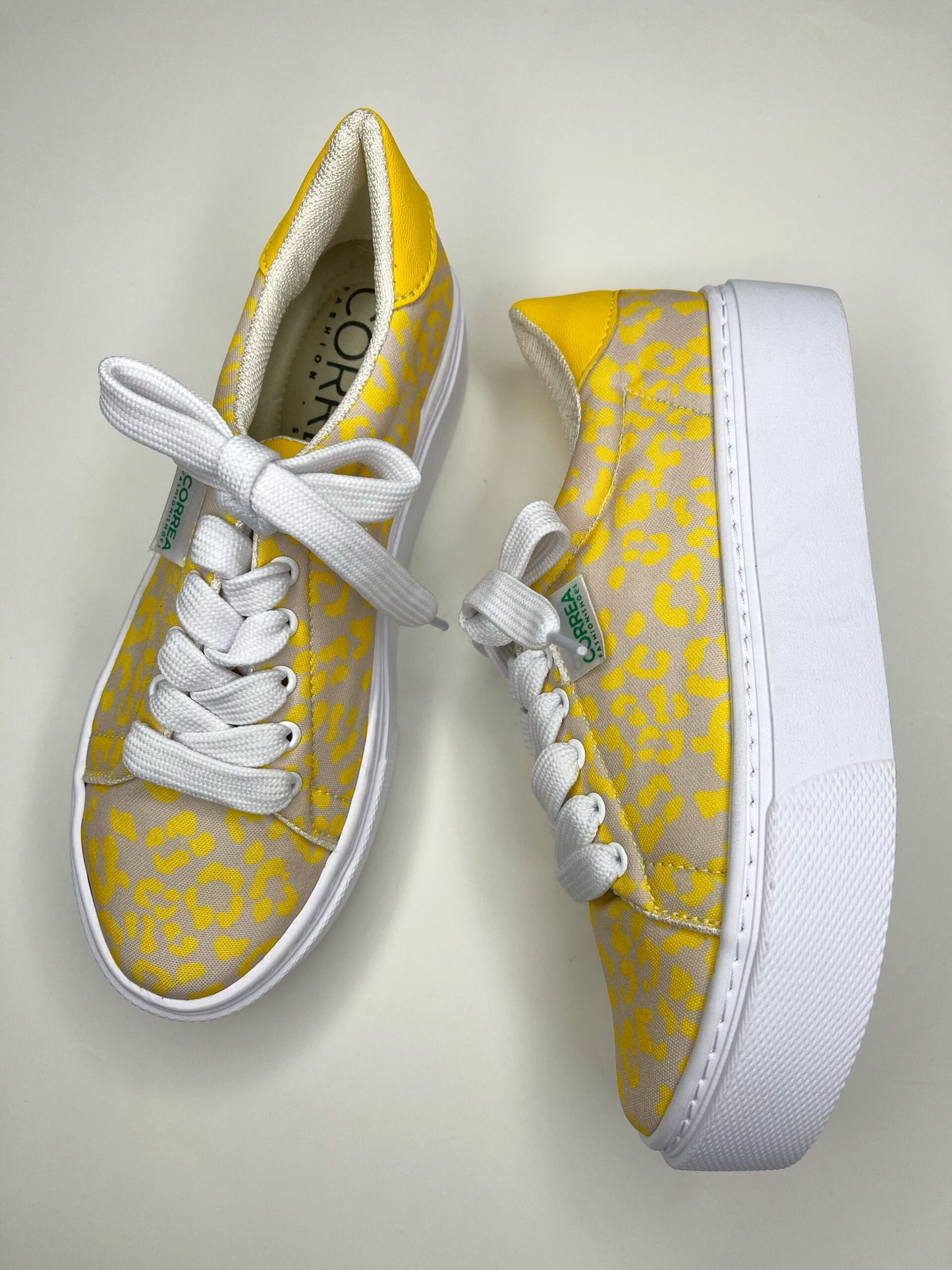 Yellow animal print sneakers