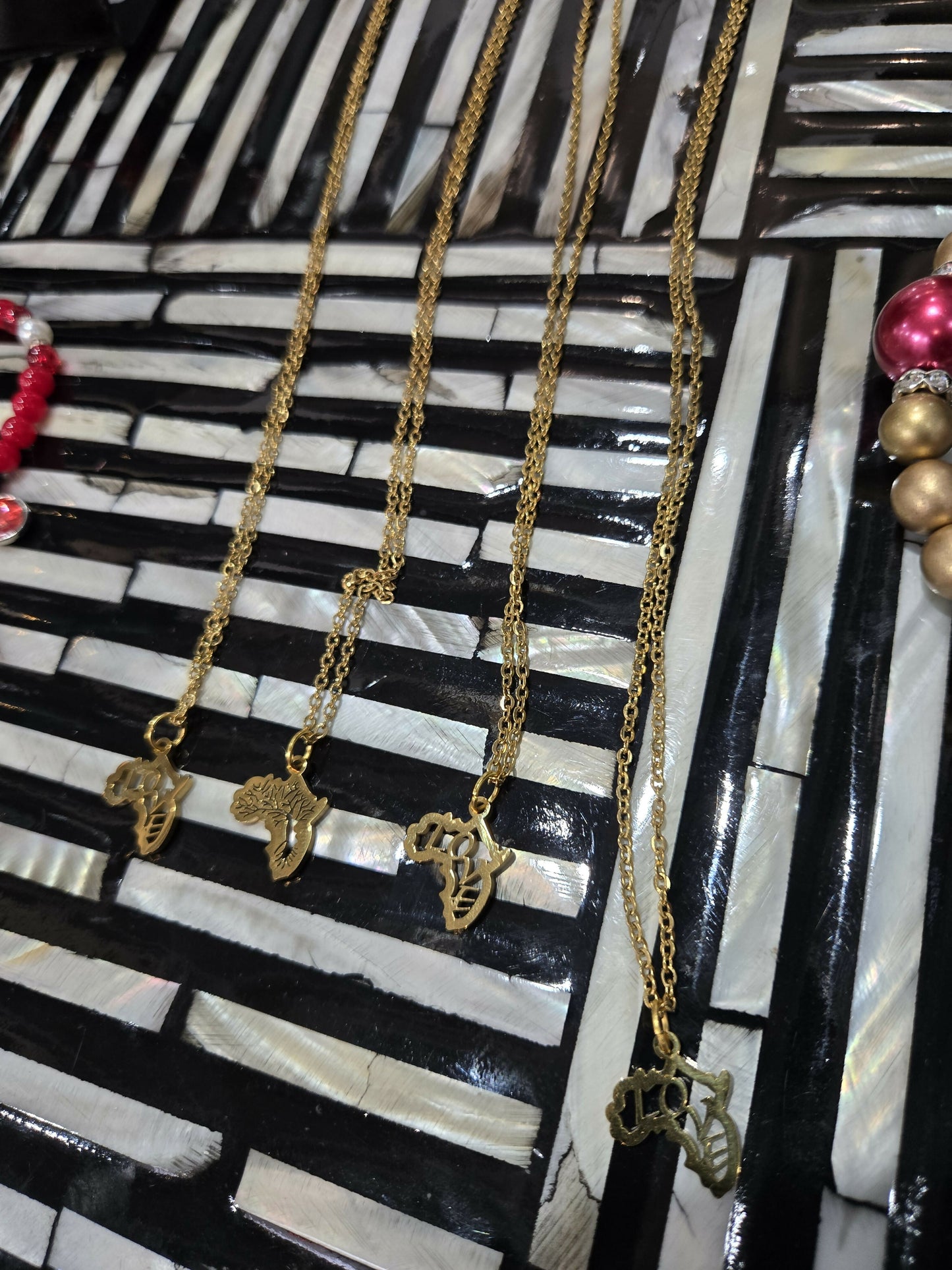 Gold love necklaces