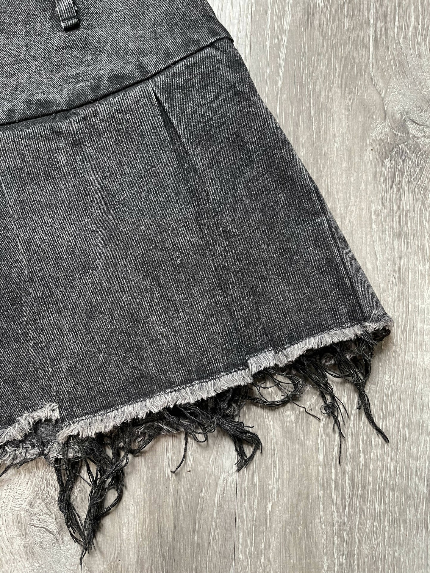 Urban Edge: Raw-Edged Dark Gray Washed Denim Pleated Skirt