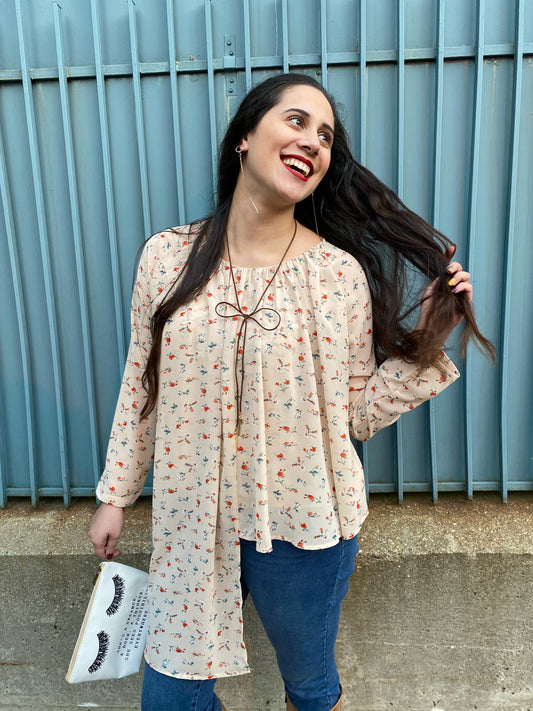 ASYMMETRICAL HEM FLORAL BLOUSE